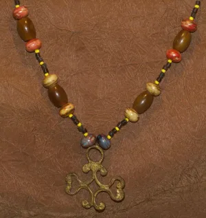Borneo Tribal Oran Ulu, Dayak, Iban Tribe Heavy Brass Earring Talisman, Ear Weight Now Used as a Pendant for a Necklace with Large Amber Beads & Old Glass Trade Beads NB20